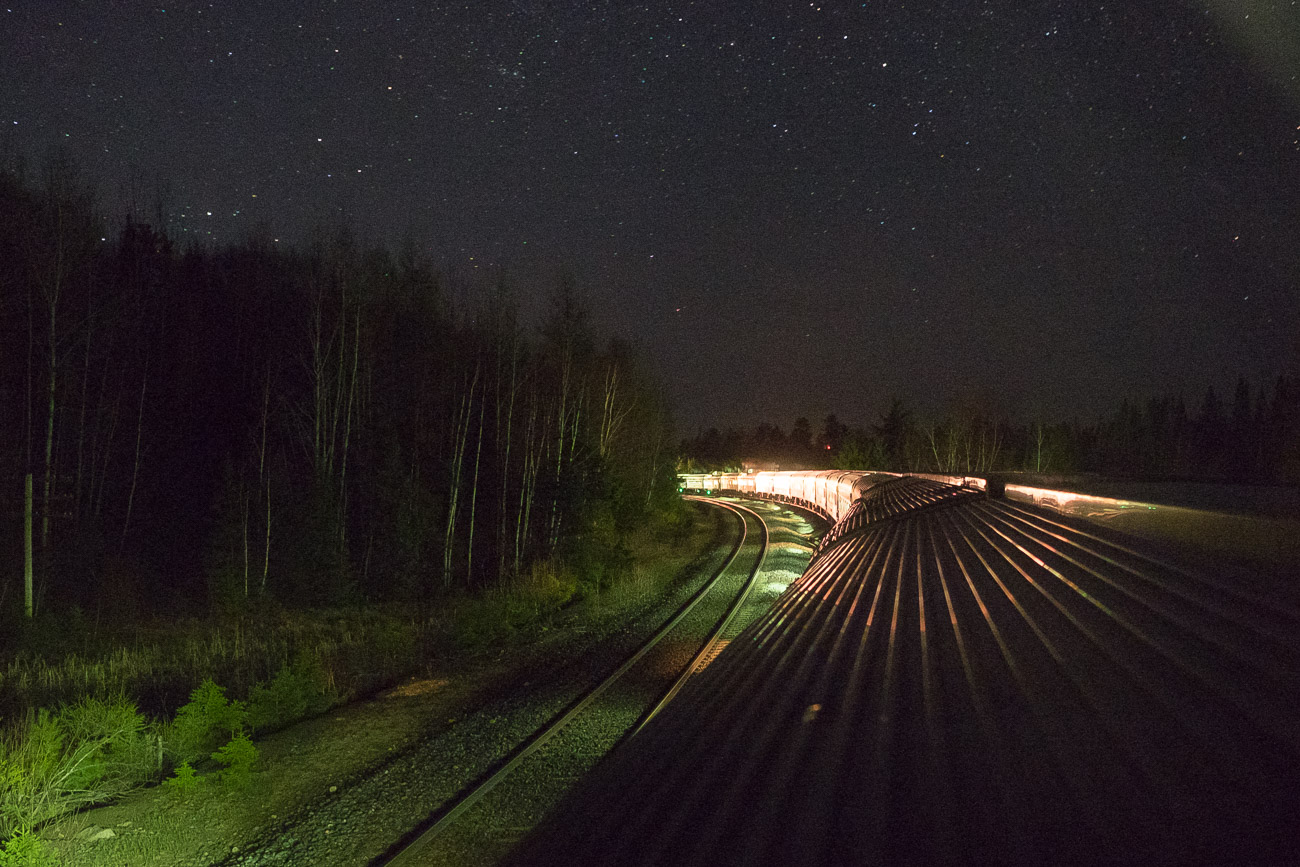 Waiting under the stars for a CN freight train to pass. Probably somewhere around Ruel, ON
